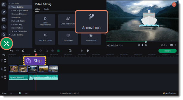 video editing software interface with various editing tools on the left, such as ‘Crop and Rotate’, ‘Color Adjustment’, and ‘Animation’. The central preview window shows a ship on water with mountains in the background. Below is a timeline with multiple video clips and an audio track. A red rectangle highlights the ‘Animation’ too
