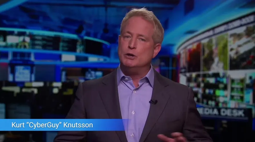 Kurt 'CyberGuy' Knutsson speaking in a news studio, with multiple screens displaying digital content in the background.